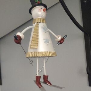 Festive Snowman Skier Ornament with Gold Accents